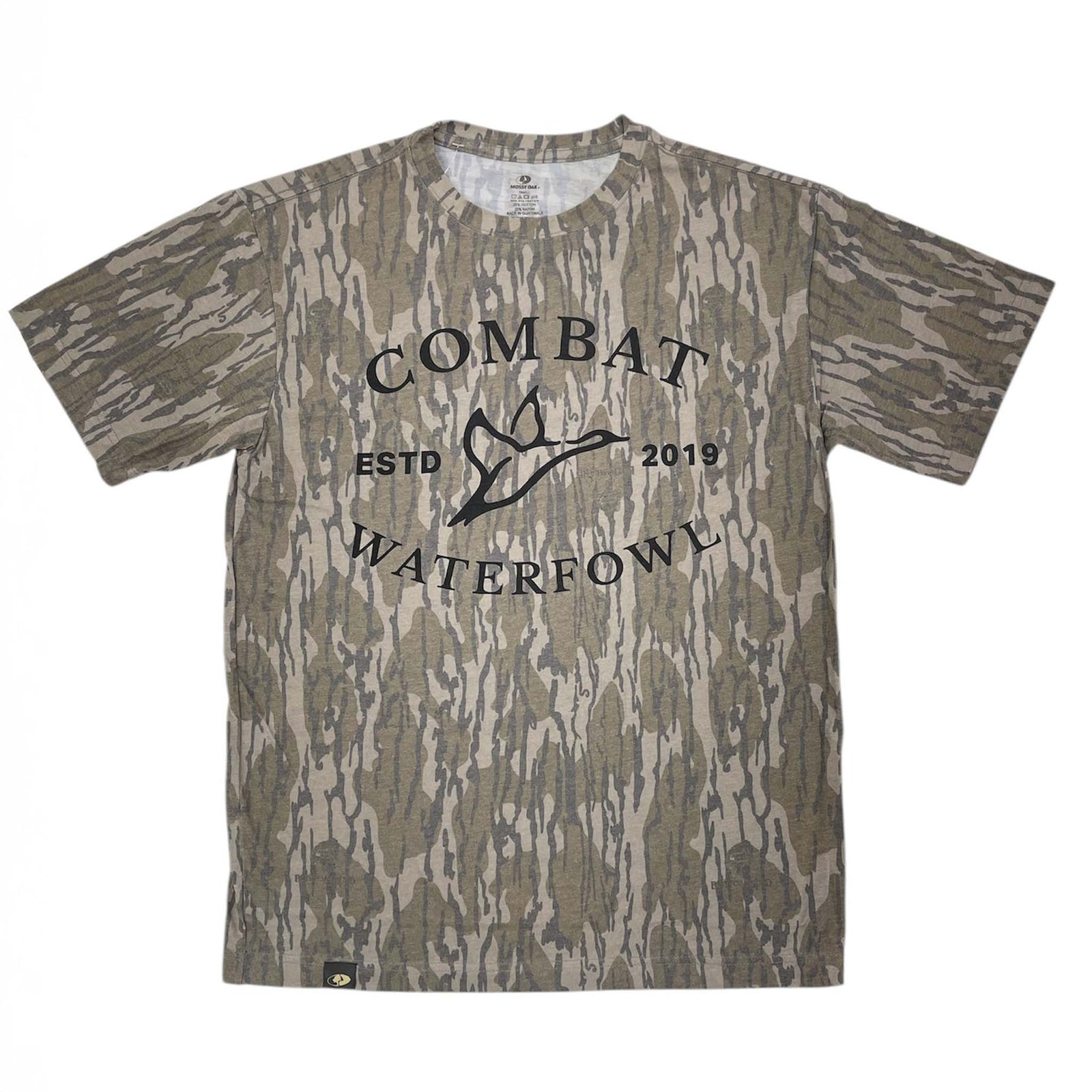 Combat Waterfowl Camo Combat Logo in color Mossy Oak Bottomland, sizes S-XXXL, 50% Polyester / 25% Cotton / 25% Rayon Blend.This shirt is an all-over Mossy Oak Bottomland camo print with a black Combat Waterfowl logo in the middle of the shirt.There is nothing printed on the back.This shirt has a nice stretch and is Ultra-soft & Breathable.