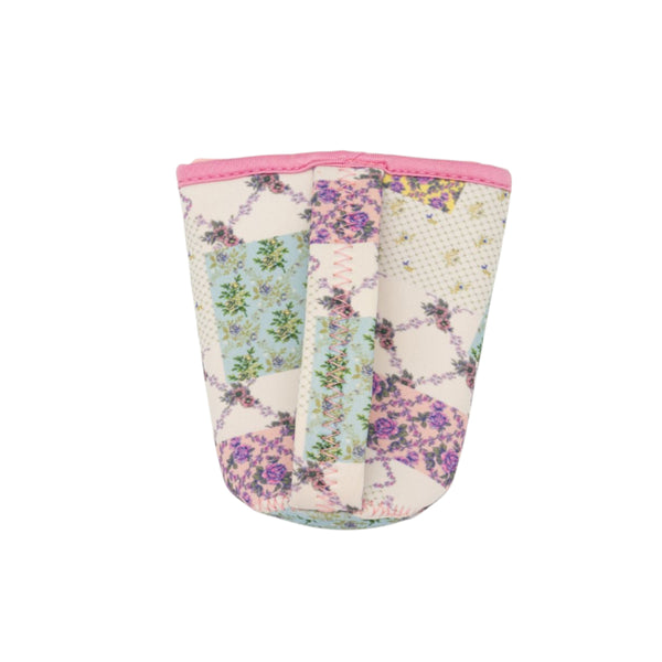 Floral-patterned drink sleeve with pink top on a white background