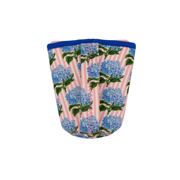 Neoprene cup sleeve with blue hydrangea pattern on a white background