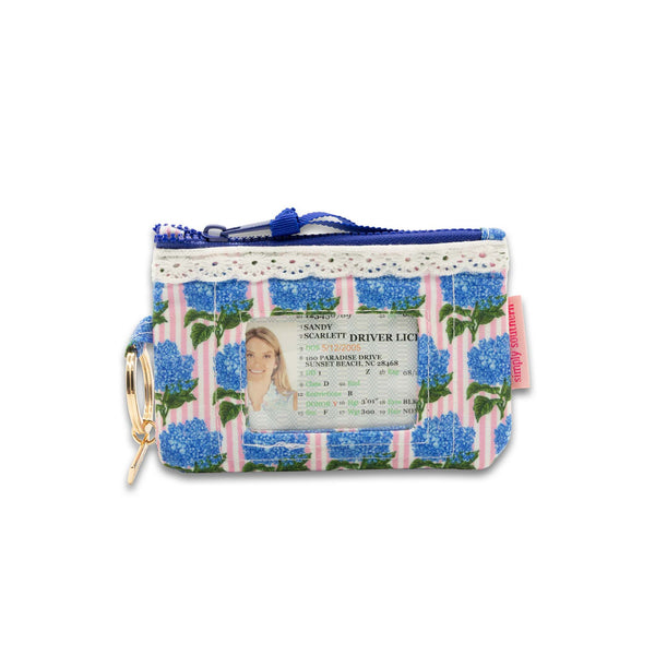 Small pouch with floral design and visible ID slot on a white background