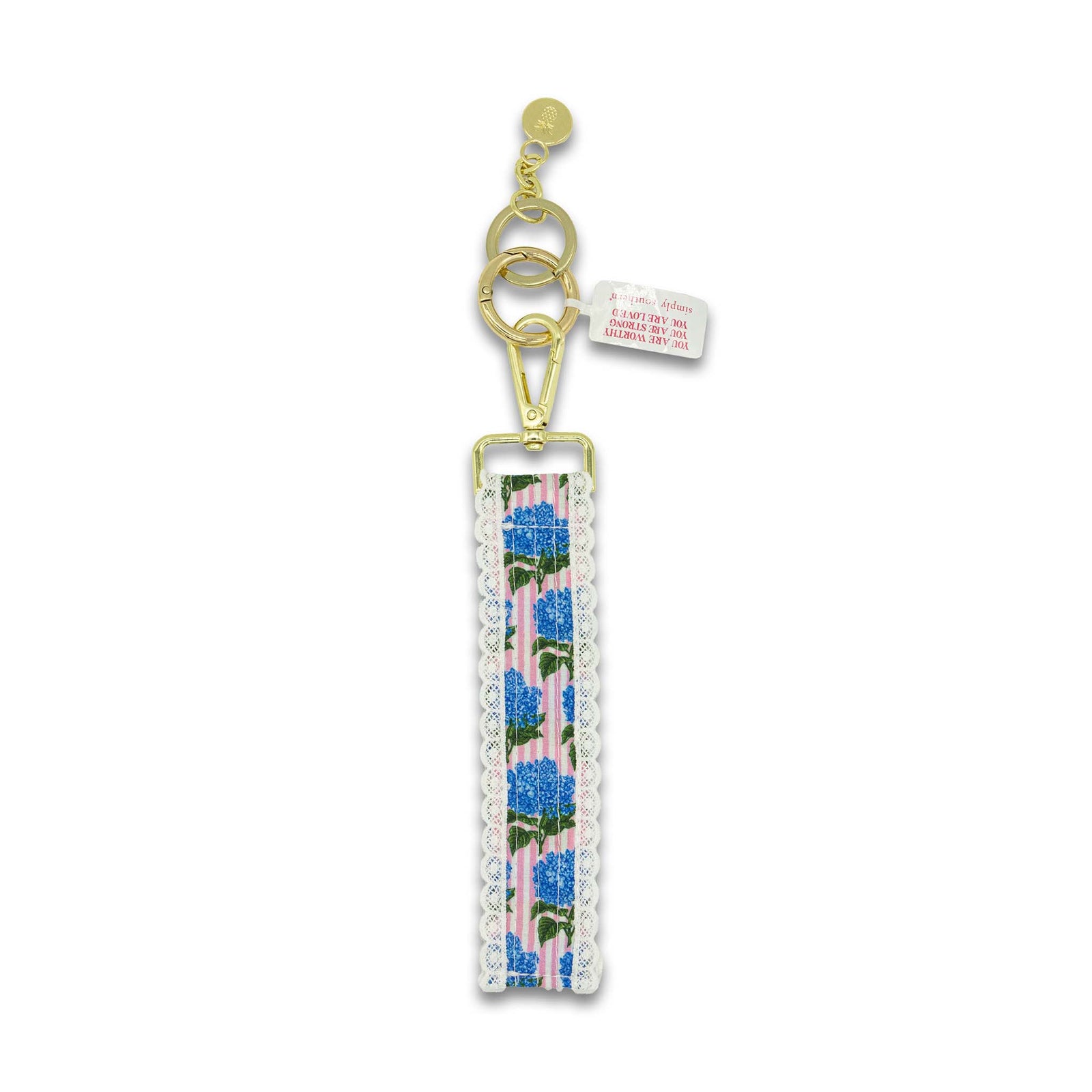 Keychain with floral patterned strap on a white background