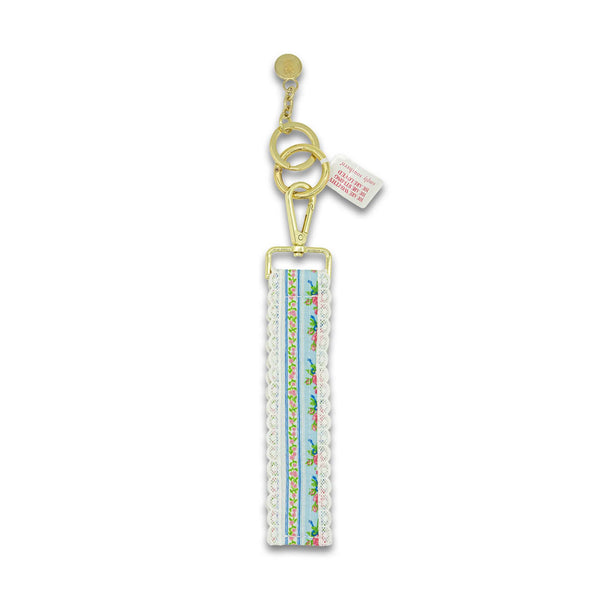 Rose stripe printed keychain with lace trim.