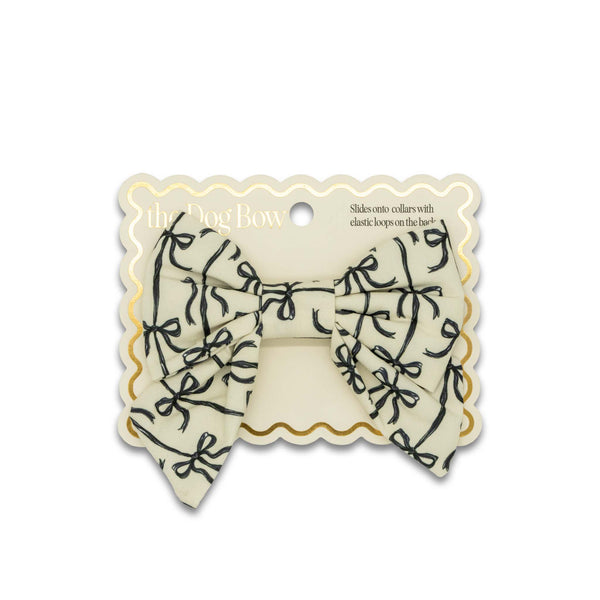 Dog bow tie on a branded card with 'the Dog Bow' logo.