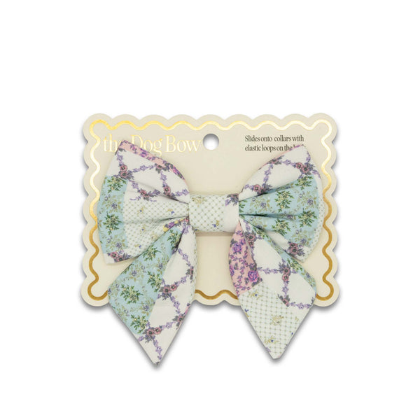 Floral patchwork patterned dog bow tie on a white background