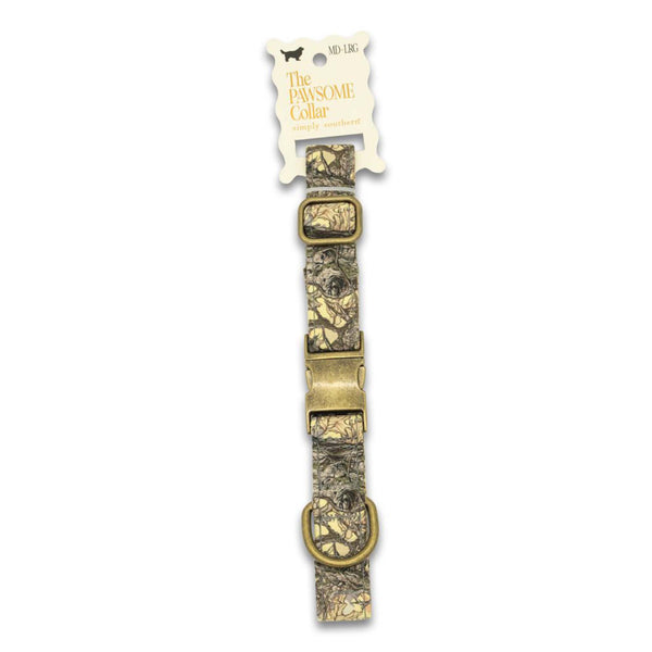 Tree camo dog collar with brass accents on a white background