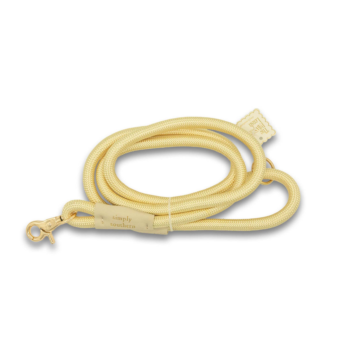 Beige dog leash with gold clasp on a white background