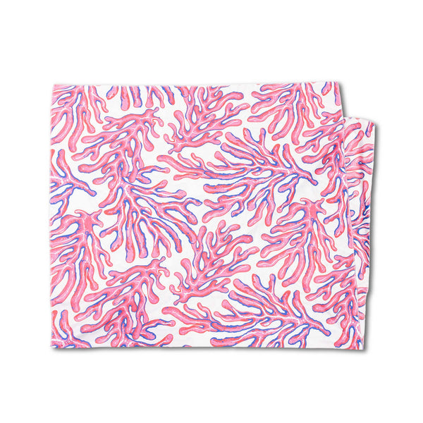 Pink and purple coral patterned quick dry towel displayed on a white background