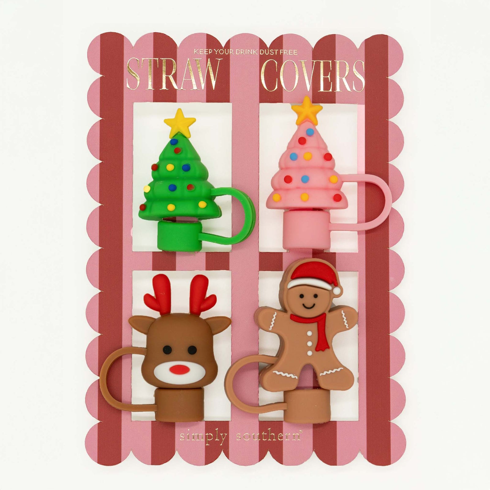 Simply Southern Christmas Straw Cover Set featuring four silicone toppers shaped like a green tree, pink tree, reindeer, and gingerbread man displayed on red and pink striped packaging.