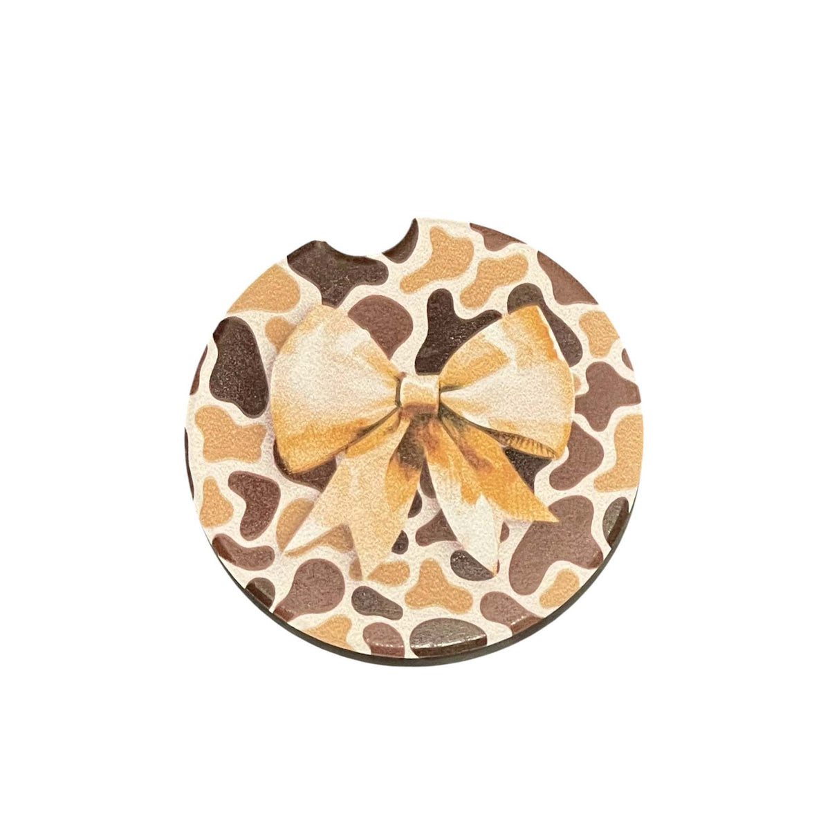 car cupholder coaster with brown and beige all over camo print and a large beige bow in the middle.