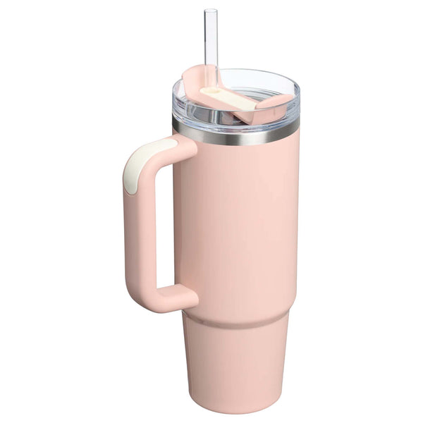 Stanley 30oz tumbler in Peach Whip Gloss, a stainless steel tumbler in a glossy soft blue finish, featuring a sturdy ergonomic handle, a clear lid, and a reusable straw.