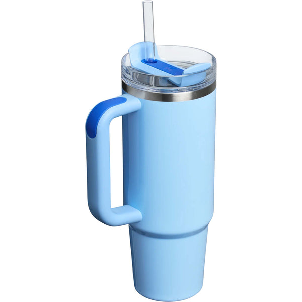 Stanley 30oz tumbler in Cornflower Blue Gloss, a stainless steel tumbler in a glossy soft blue finish, featuring a sturdy ergonomic handle, a clear lid, and a reusable straw.