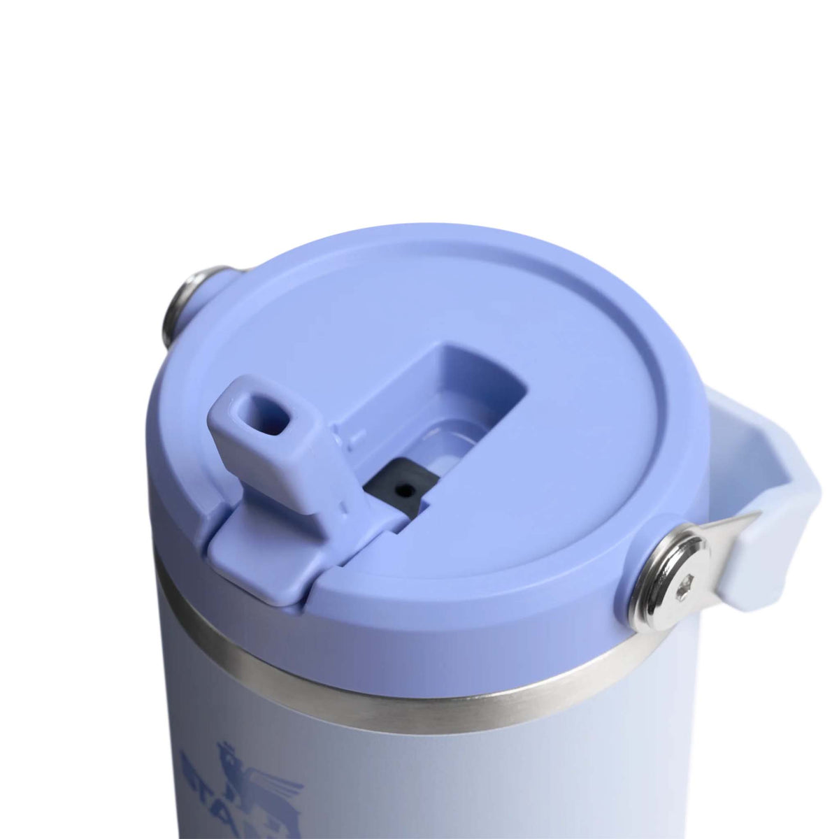Close-up of Stanley Dewdrop Quencher tumbler lid with lavender flip straw and stainless steel trim.