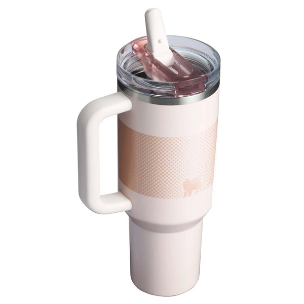 Angled top view of Stanley Quencher in Rose Quartz Fade showing the tall design and white straw flipped up.