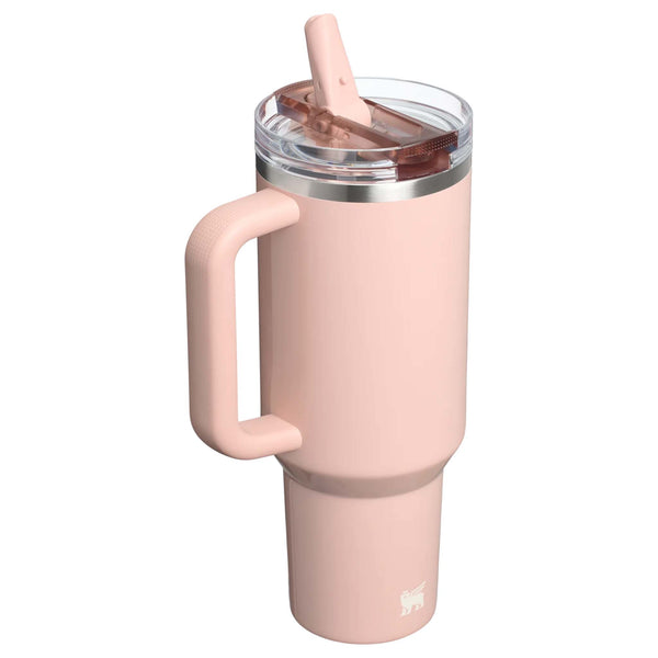 Back view of The 40oz Quencher ProTour Flip Straw Tumbler in Peach Whip Gloss shown with the straw in the flipped up position.