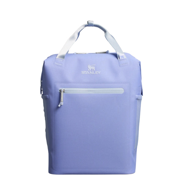 Stanley Madeline Mini Backpack Cooler in Hydrangea displayed upright. The cooler features a light lavender-purple exterior, adjustable padded backpack straps, a front zippered pocket, and a top carry handle.