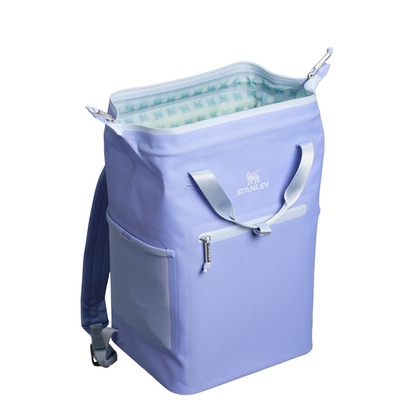 Stanley Madeline Mini Backpack Cooler in Hydrangea displayed upright. The cooler features a light lavender-purple exterior, adjustable padded backpack straps, a front zippered pocket, and a top carry handle.