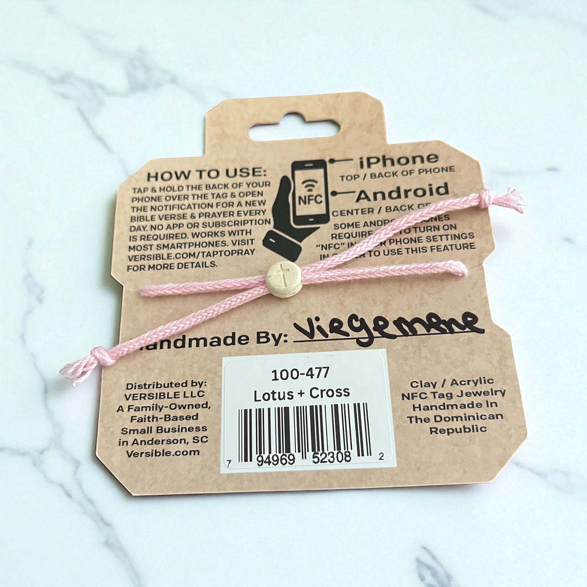 NFC tag with pink string on a cardboard backing, showing 'Viegemere' branding.