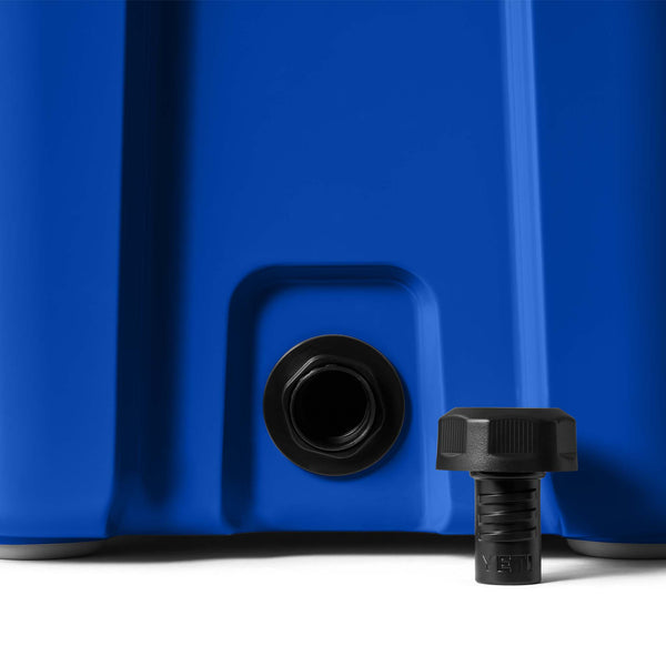 Blue container with black valve and cap on a white background