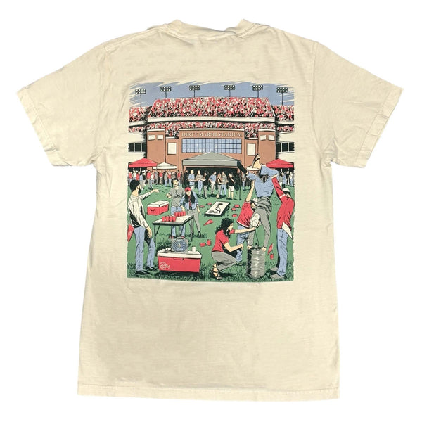 Beige t-shirt with a graphic of people at a stadium on a white background