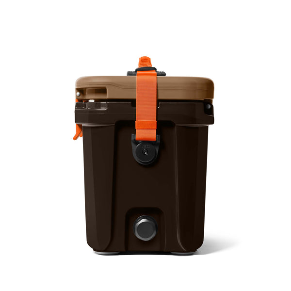  side view of the YETI Roadie 15 Hard Cooler in Wetlands Camo showing carry strap and camo YETI logo.