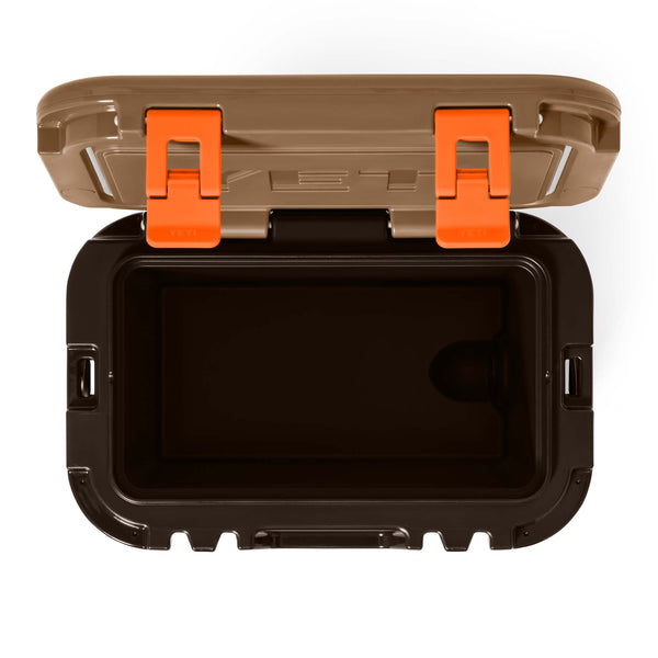 Top-down view of open cooler showing the interior compartment and orange latches.