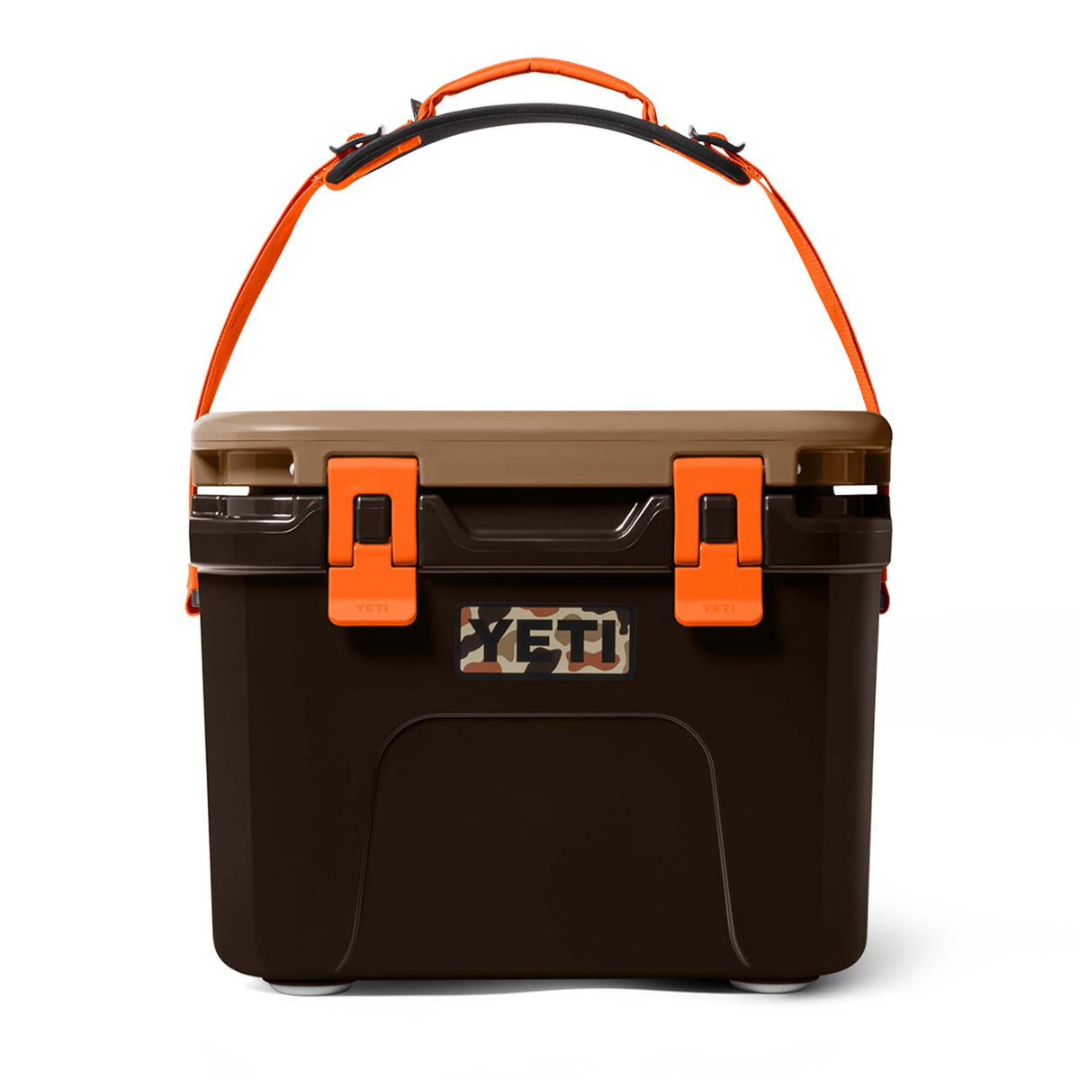 Cooler shown with handle extended upward for easy transport; orange and black padded grip visible.