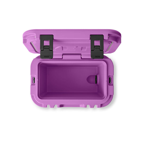 Purple YETI cooler with black straps on a white background
