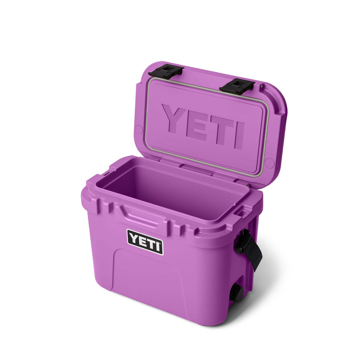 Purple YETI cooler with black straps on a white background