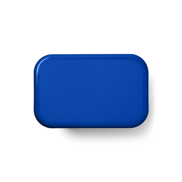 Blue rectangular YETI lid on a white background