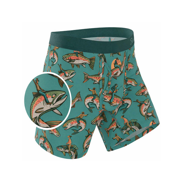 Teal boxer briefs with fish pattern on a white background