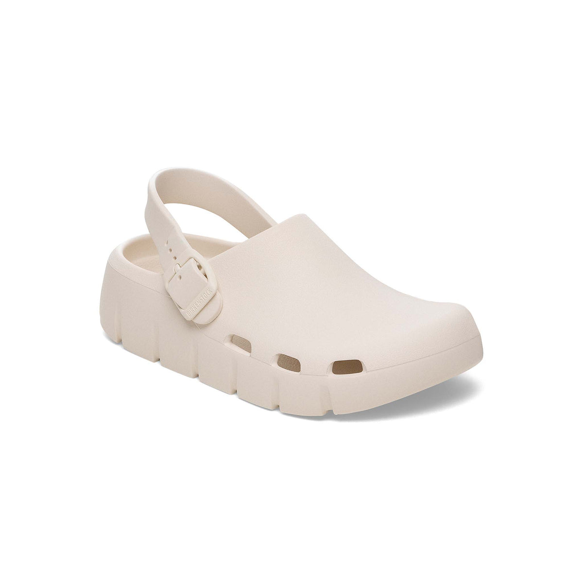 Off white youth clog shoe by Birkenstock a white background