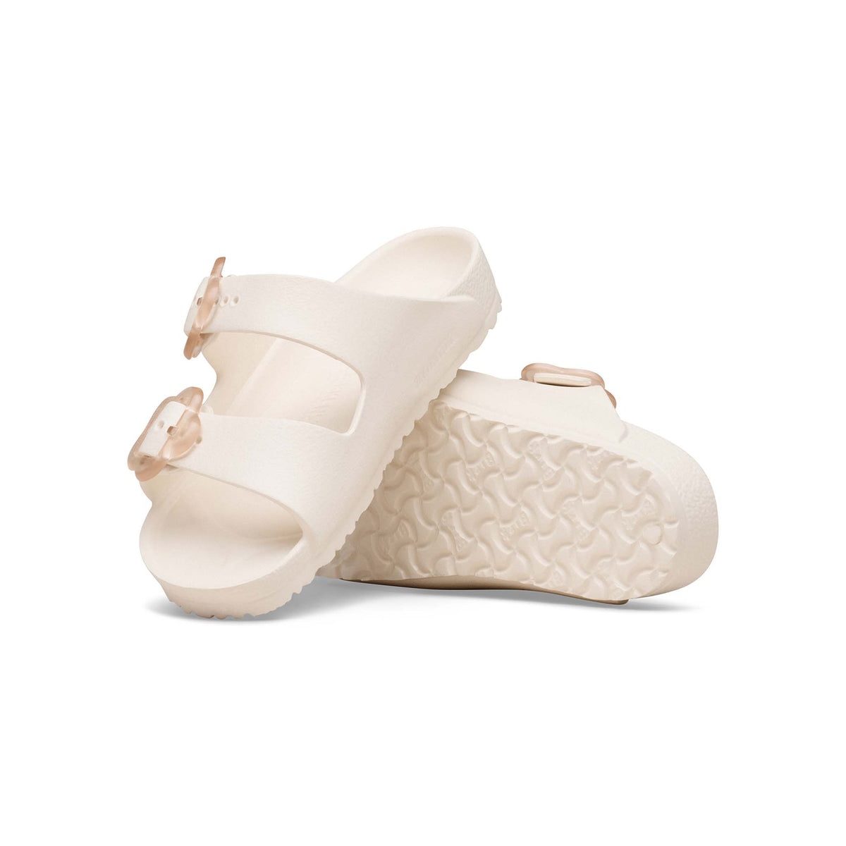 Birkenstock Youth Arizona Flower EVA in Eggshell with clear flower buckles shown on a white background.