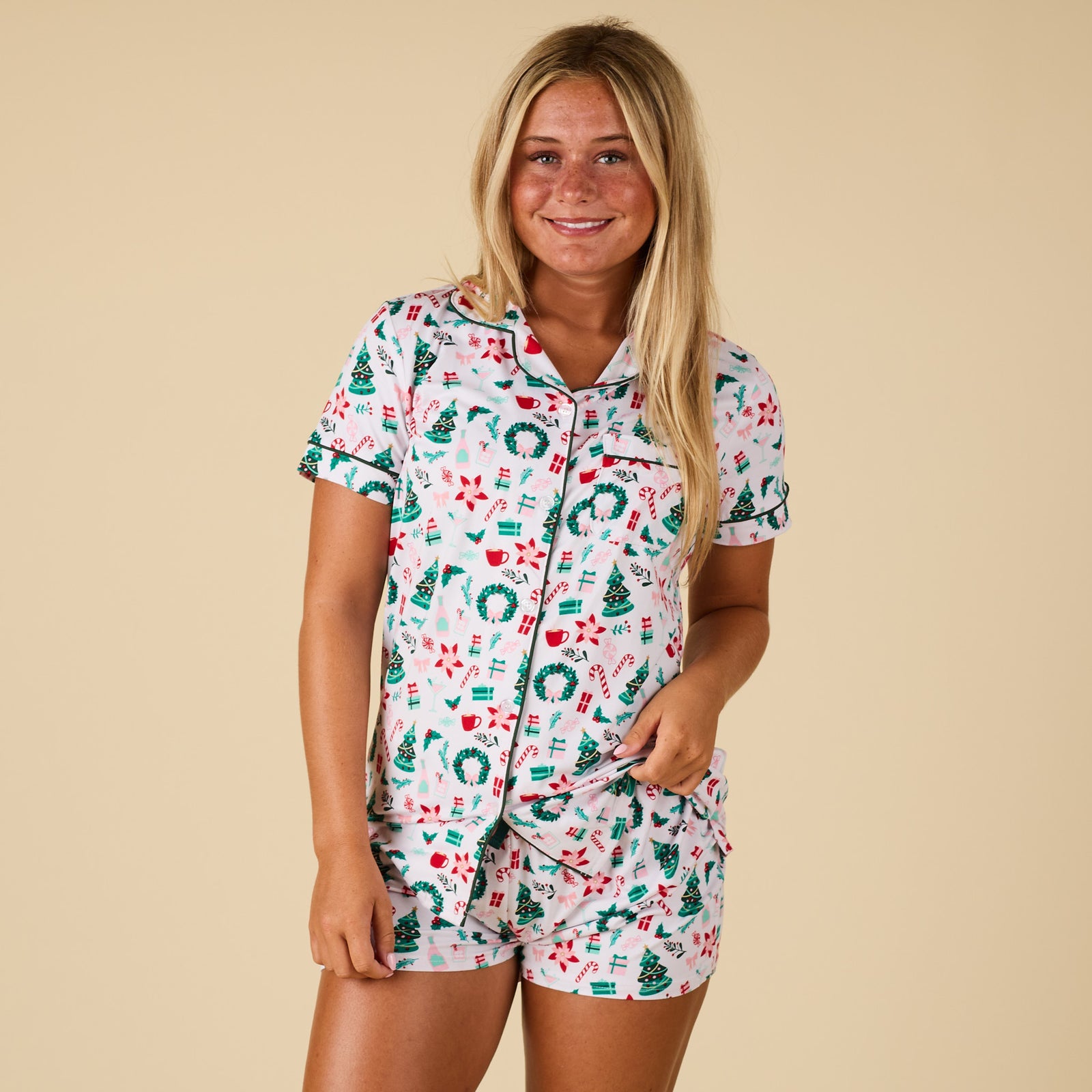 Woman wearing Christmas printed pajamas.