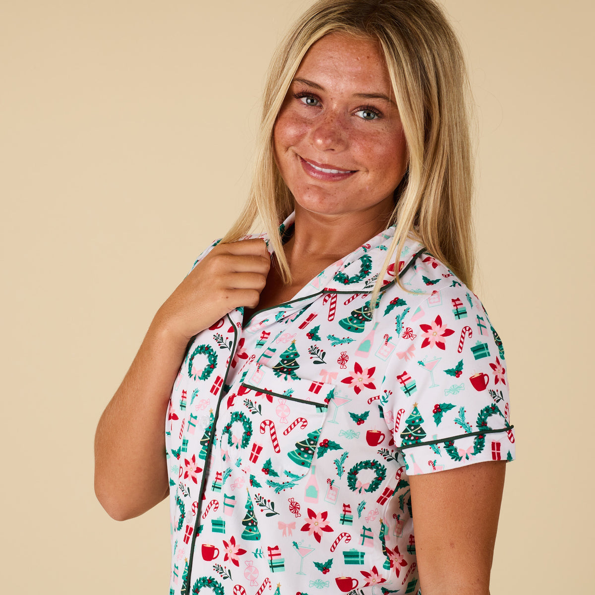 Close up detail shot of women's Christmas pajama top collar and front pocket.