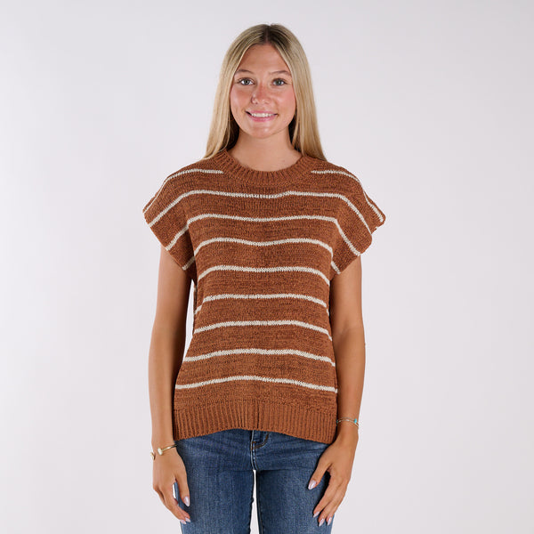  Woman wearing a brown and white striped sweater on a white background