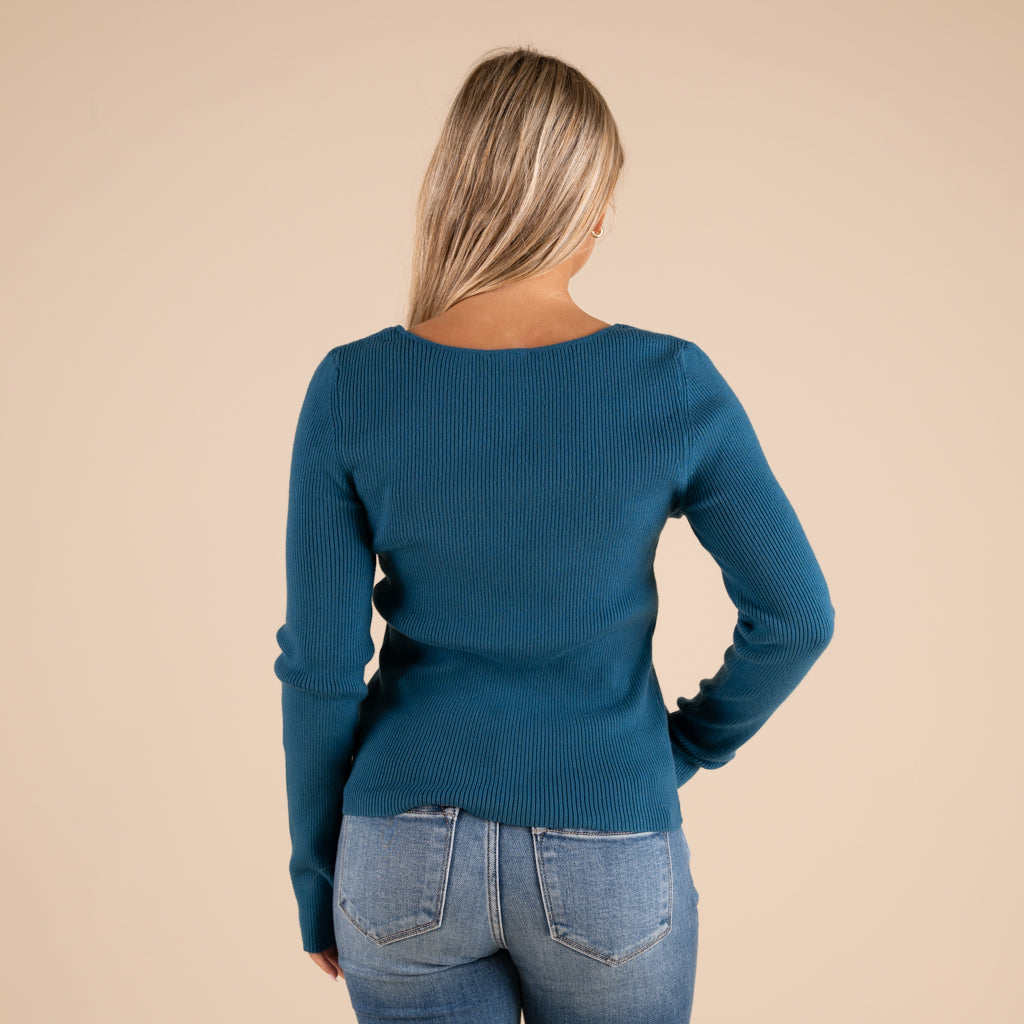 Very J Grey Ribbed V-neck Button Down Long Sleeve Sweater on model paired with medium wash denim jeans