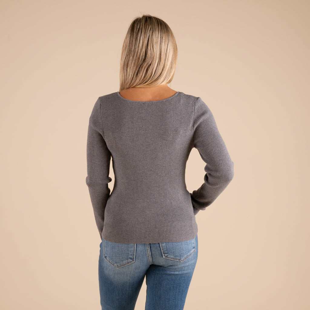 Very J Grey Ribbed V-neck Button Down Long Sleeve Sweater on model paired with medium wash denim jeans