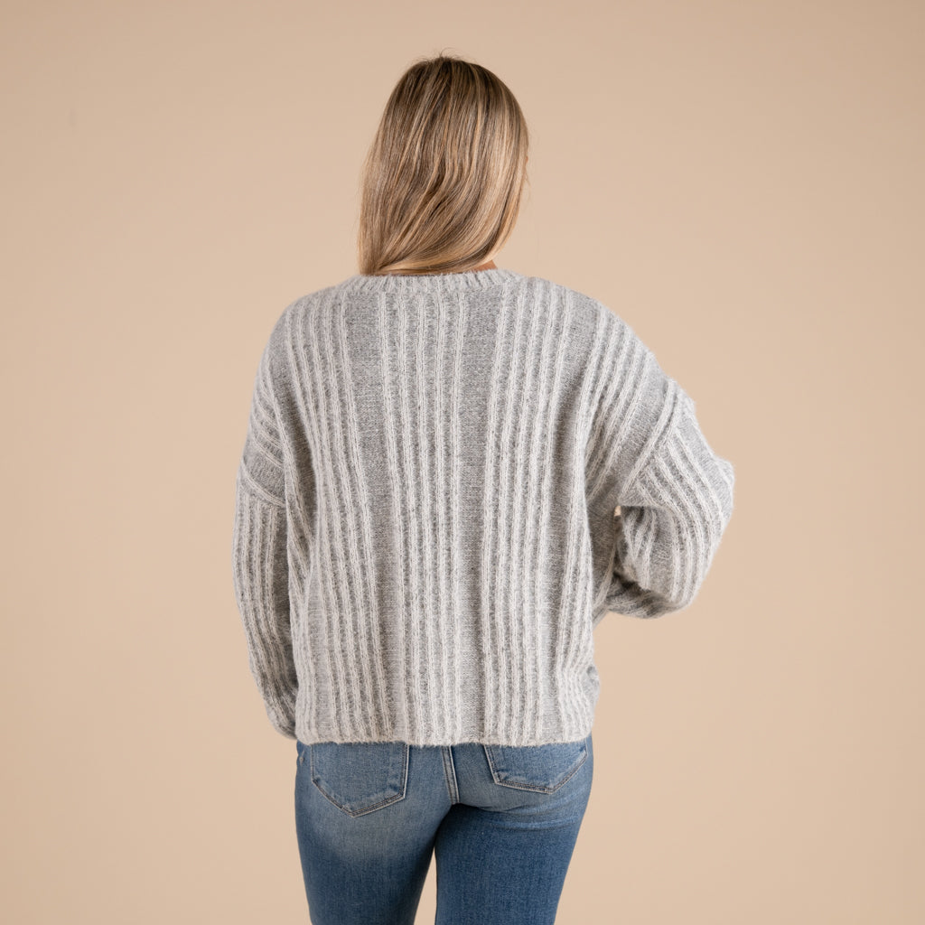 Very J Fuzzy Vertical Stripe Crewneck Sweater in grey shown on model paired with denim jeans