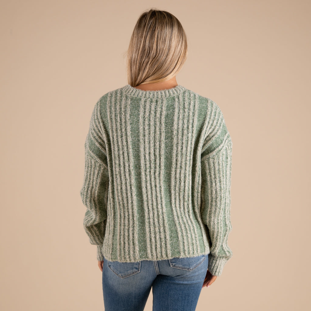 Very J Fuzzy Vertical Stripe Crewneck Sweater in sage shown on model paired with denim jeans
