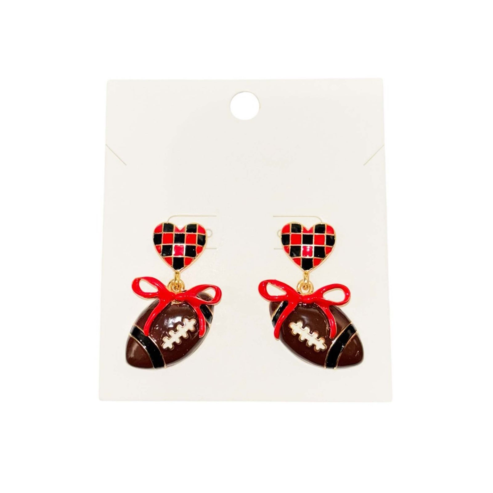 red and black checkered heart stud earrings featuring dangling football charms tied with red bows.