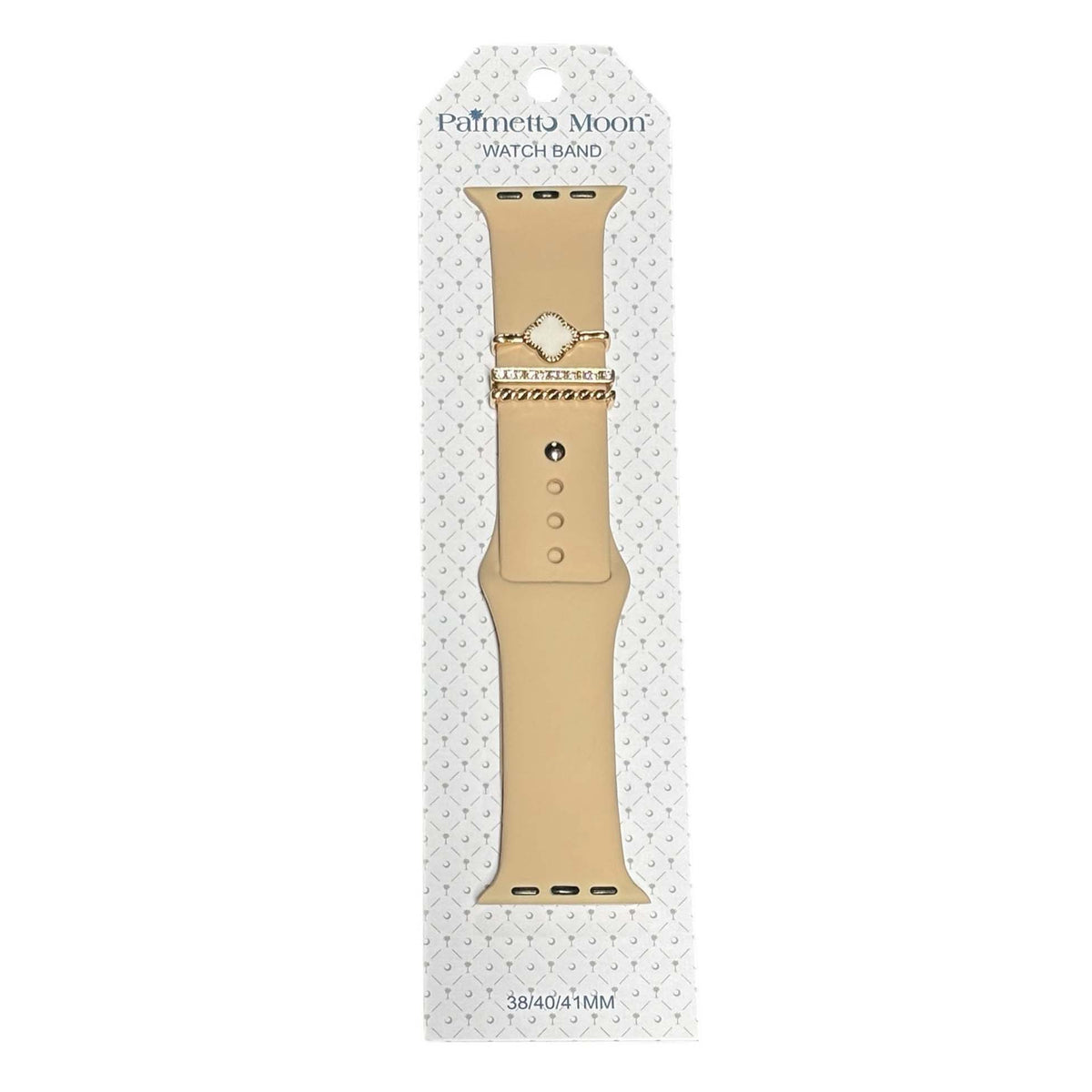 Beige Palmetto Moon Apple Watch band with gold accent rings featuring a white clover charm, rhinestone bar, and rope twist design.