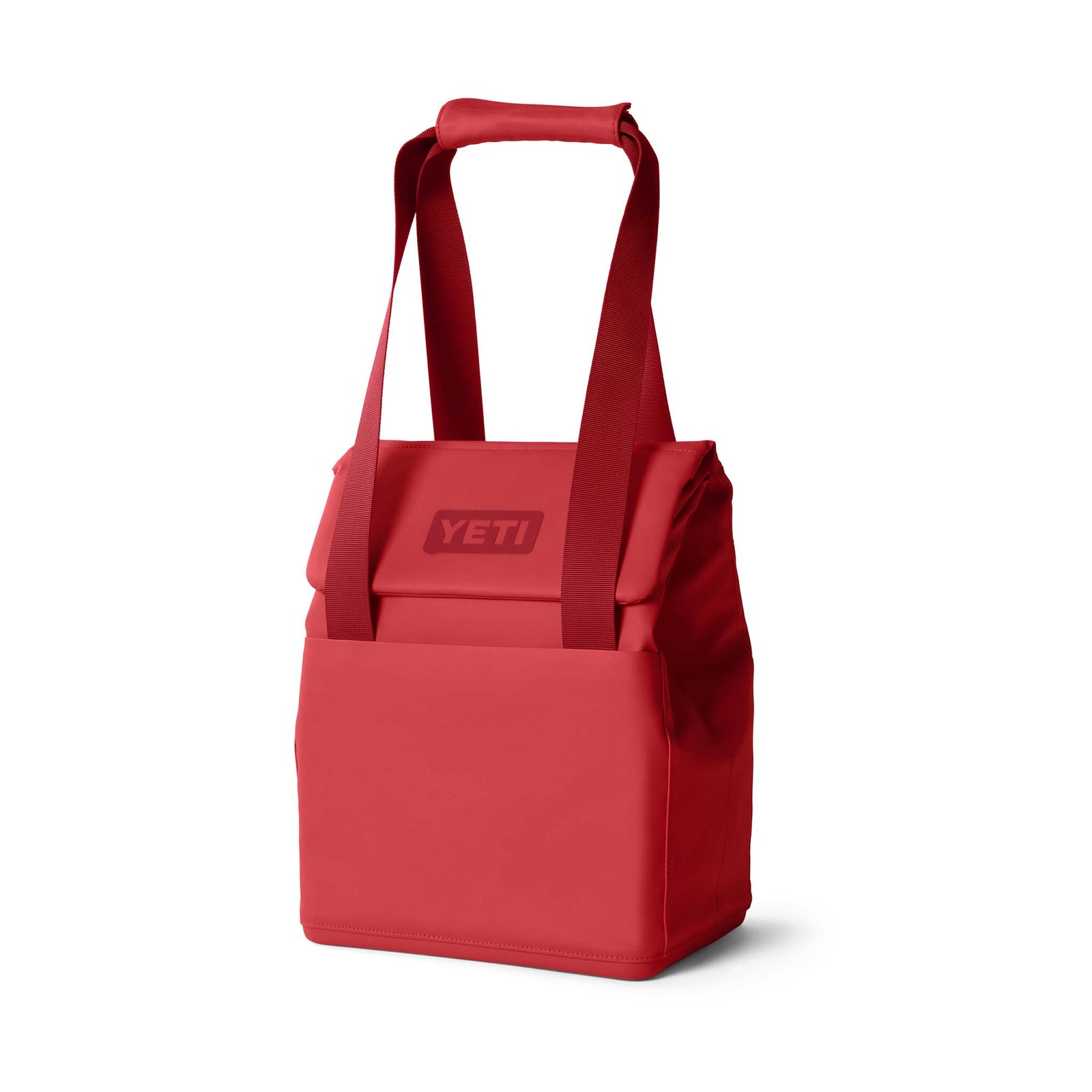 Side view of the YETI Daytrip 14L Tote Bag in Rescue Red with the shoulder strap extended upward.