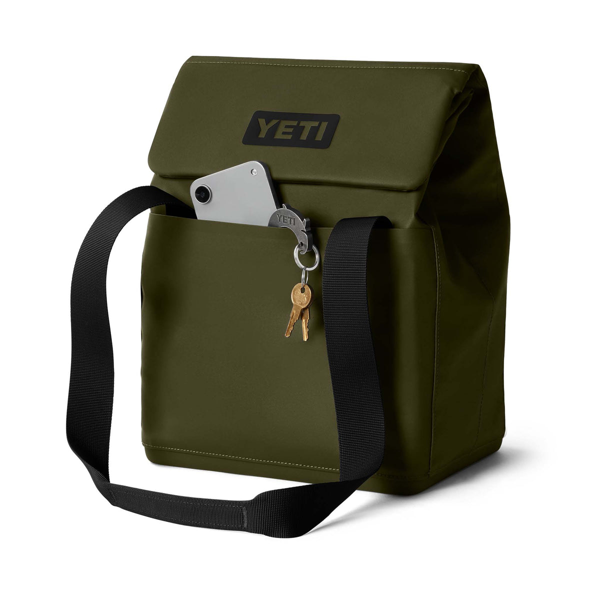 YETI Daytrip 14L Tote Bag in Olive with front pocket holding a phone and keys attached to a keychain.