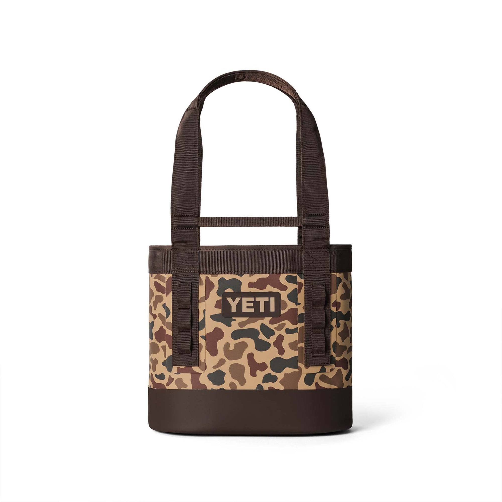 Front view of the YETI Camino 20 Carryall in Wetlands Camo with brown base and short handles.