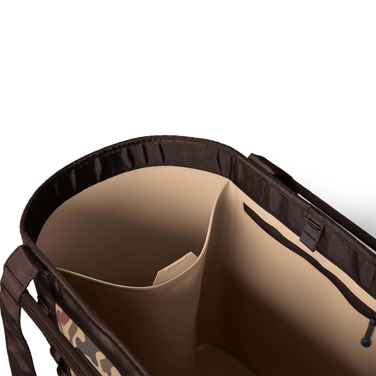 Interior close-up of the YETI Camino 50 Carryall showing zippered storage and thick side walls.
