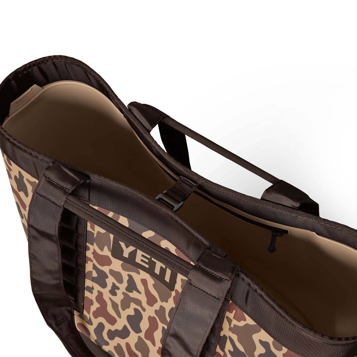 Close-up of the top buckle strap securing the YETI Camino 50 Carryall in place.