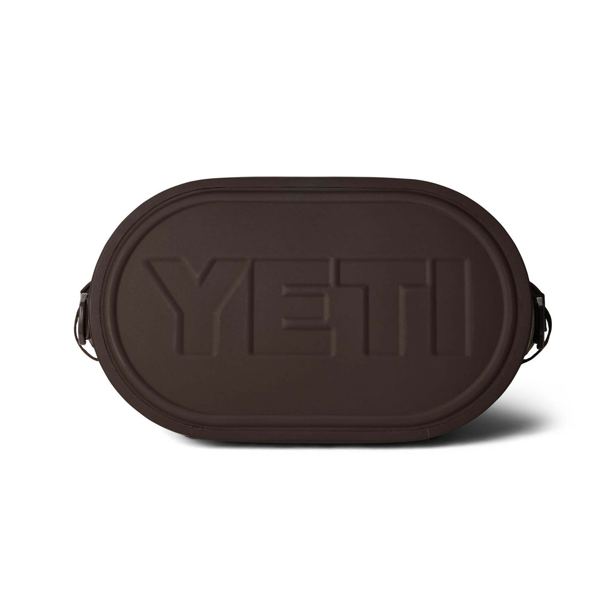 Bottom of YETI Hopper M30 Soft Cooler in dark brown with embossed YETI logo.