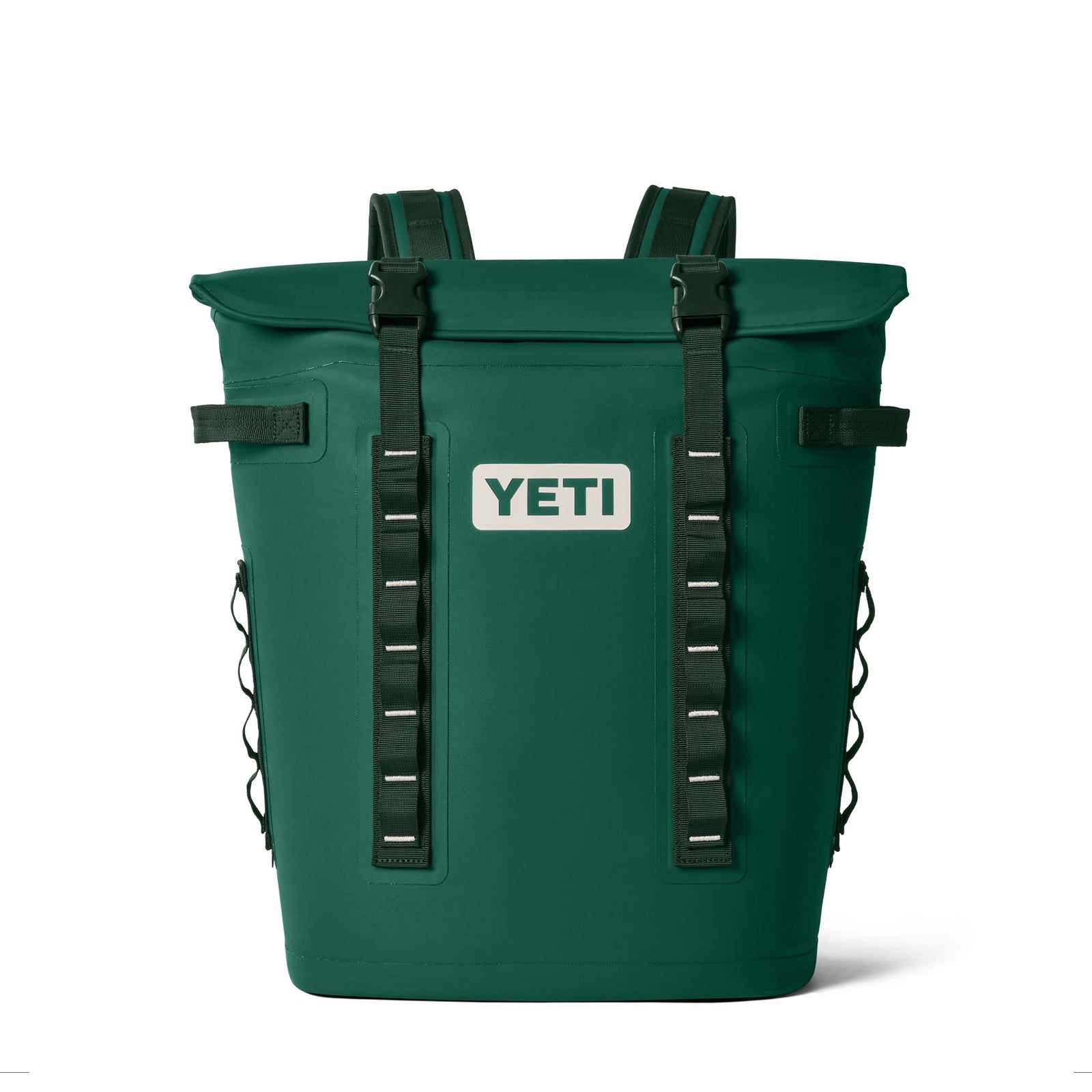 Front view of the YETI Hopper M20 Backpack Cooler in Black Forest Green with YETI logo and dual front gear attachment strips.