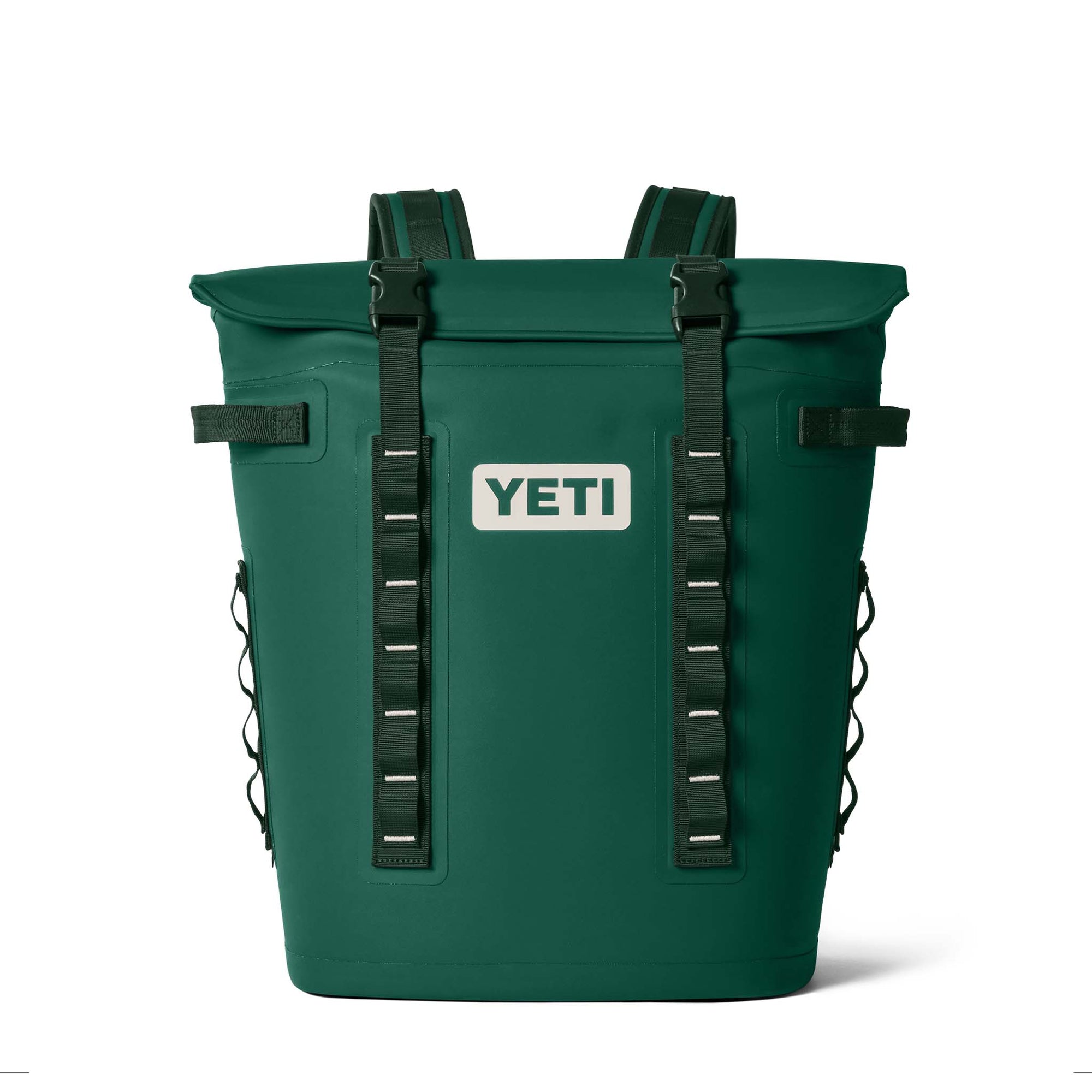 Front view of the YETI Hopper M20 Backpack Cooler in Black Forest Green with YETI logo and dual front gear attachment strips.
