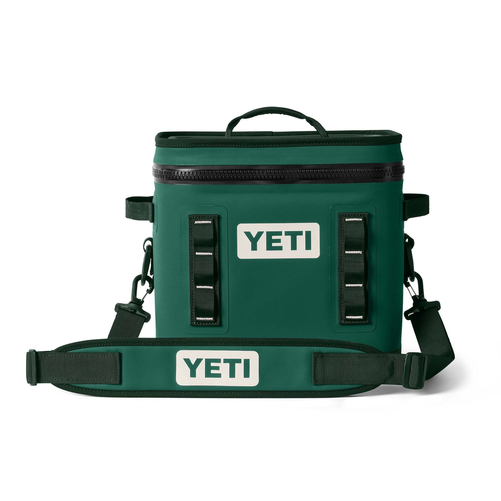 Front view of the YETI Hopper Flip 12 Cooler in Black Forest Green with adjustable shoulder strap and two vertical gear loops.